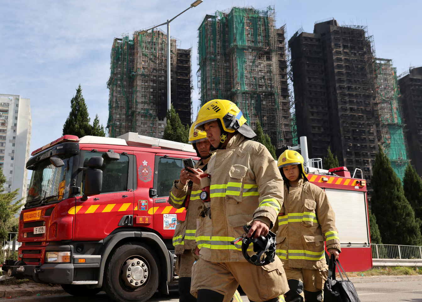 Hong Kong tower fire toll rises to 128, more arrests made