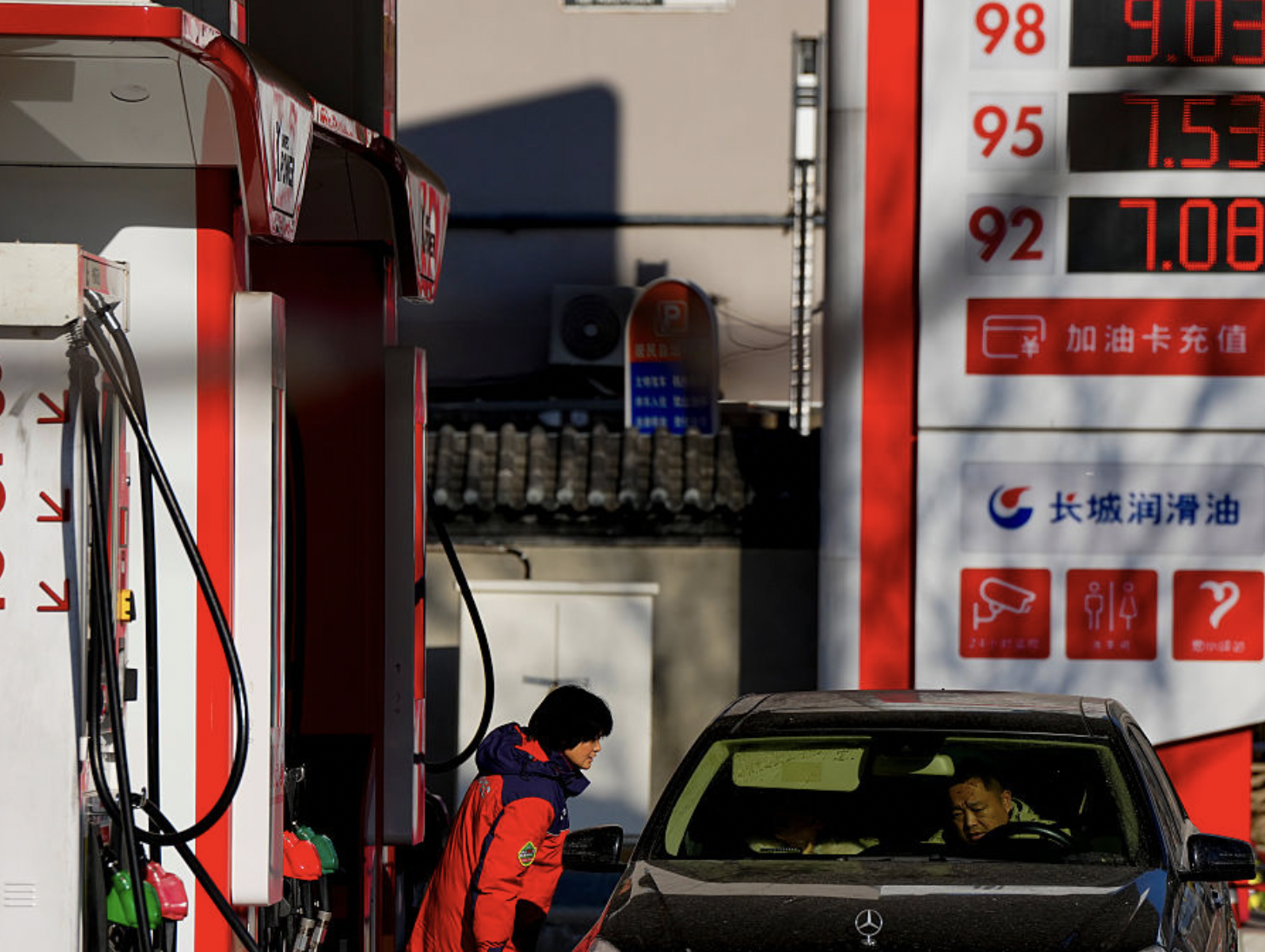 China Raises Fuel Prices as Global Oil Surge Triggers Long Lines at Gas Stations